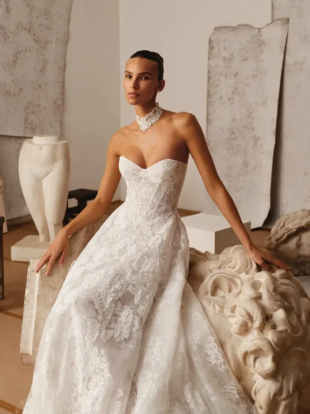 model is wearing a strapless bridal gown